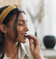 Girl eating a SNCK Bar