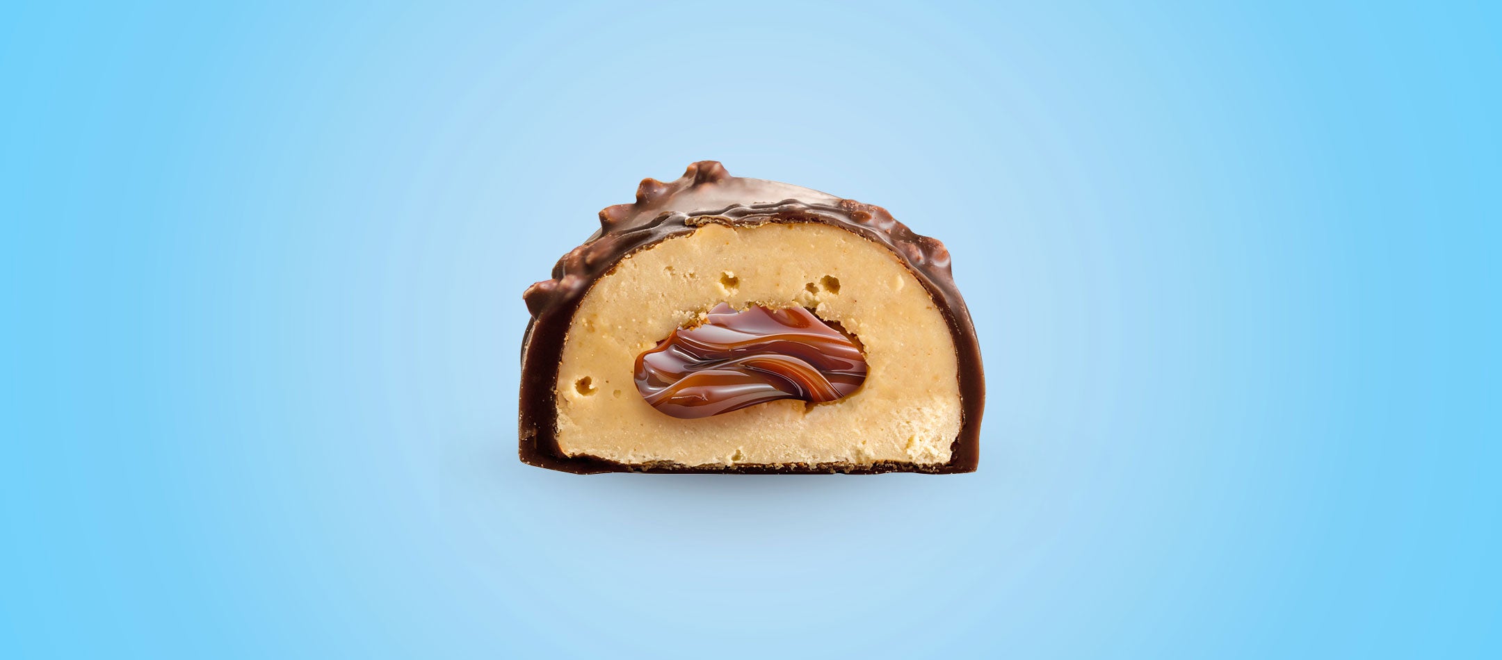 Cutaway view of Caramel Pop SNCK Bar on a blue background